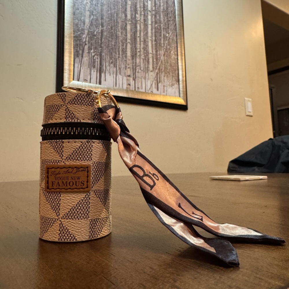 Geometric Patterned Cylinder Bag with Scarf Accent